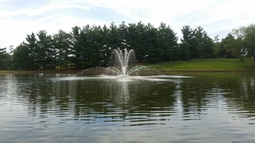 Fountain in large pond